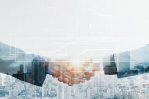 RM Digital Life - Händeschütteln zwischen Partnern
